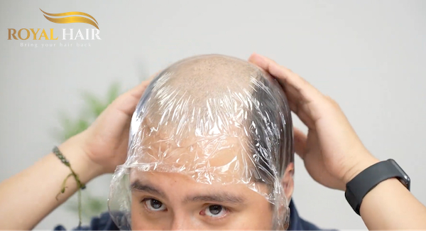 Prep and stretch the Saran wrap